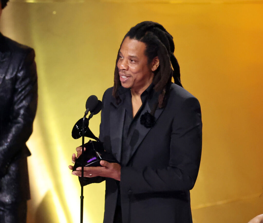 The rapper Jay-Z is holding is an award.